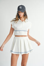 Tycho Pleated Varsity Mini Skirt